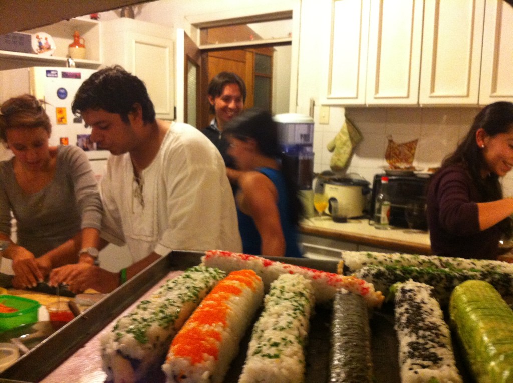 an active kitchen filled with friends