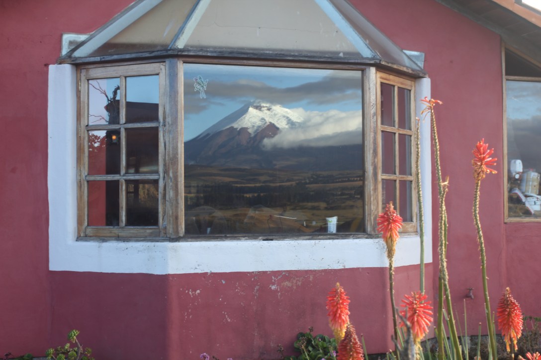 the reflection of Cotopaxi in the windows of Secret Garden