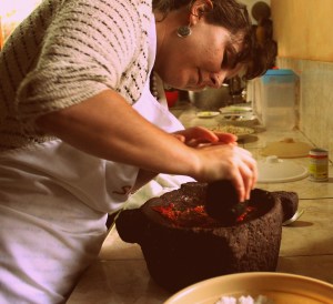 Kelsey working the mortar and pestle