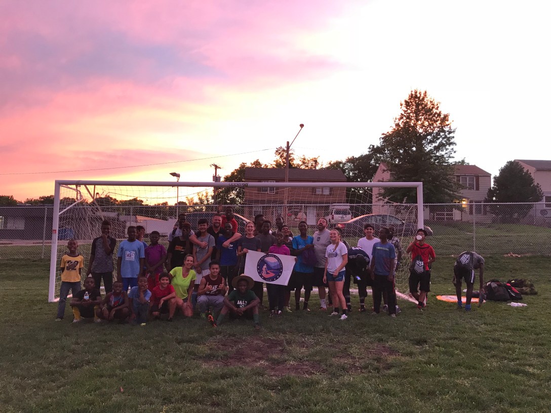 playing soccer with refugee kids in Kansas City